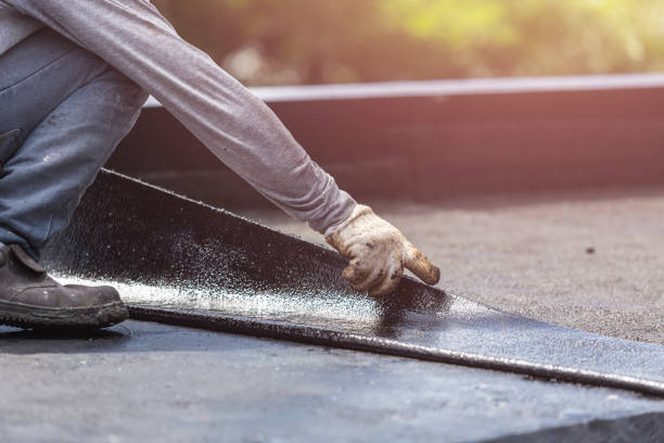 Professional Emergency Waterproofing technician working in Eland, WI